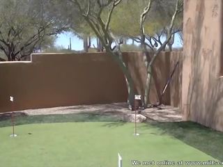 Stepson teaches stepmom how to golf